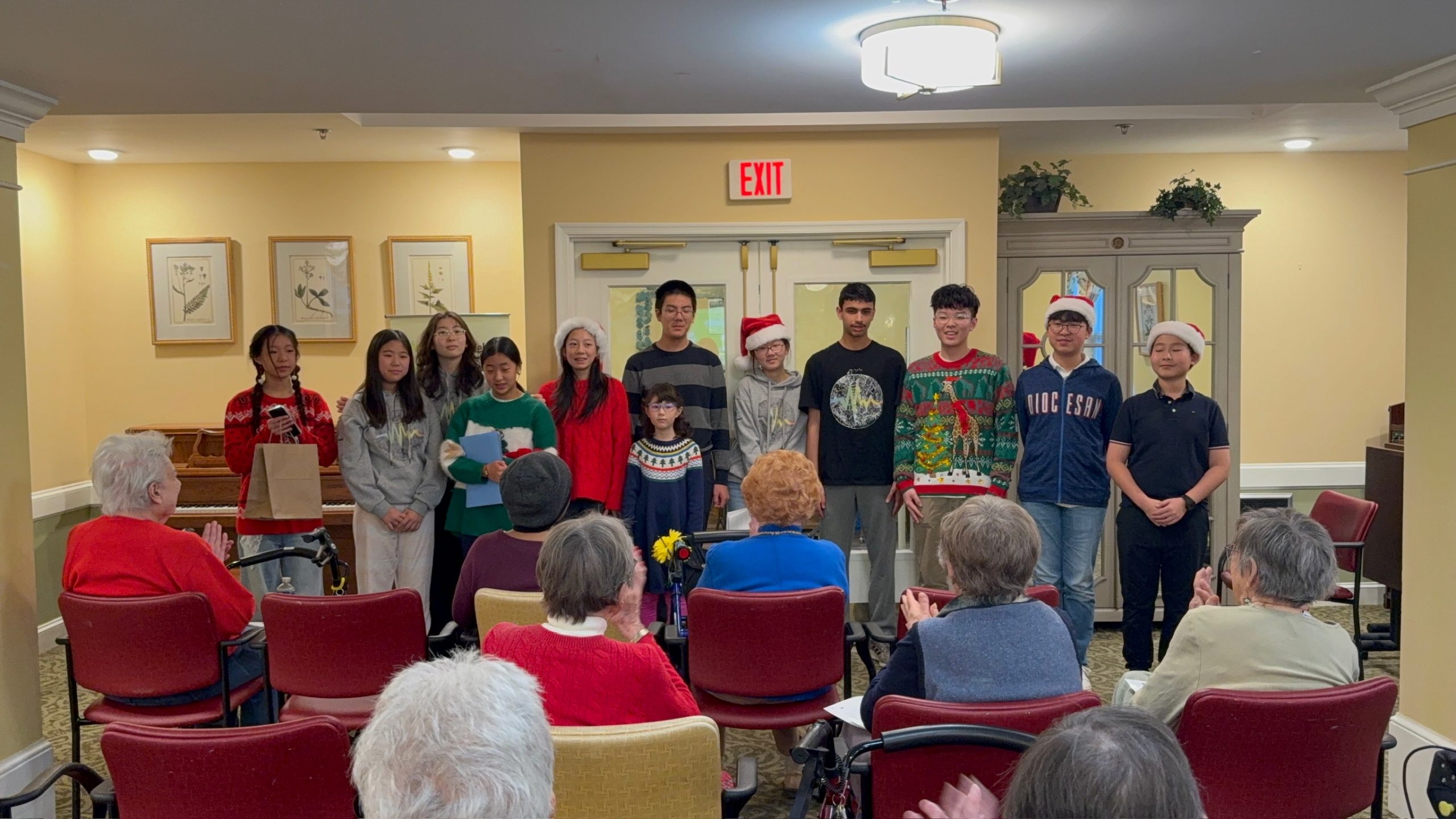 Spreading Holiday Cheer: Volunteering and Christmas Song Guessing Games at Chesterbrook Residences